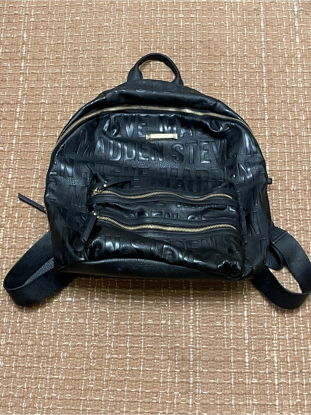 Steve Madden Black Embossed Logo Mini Backpack with Gold Hardware